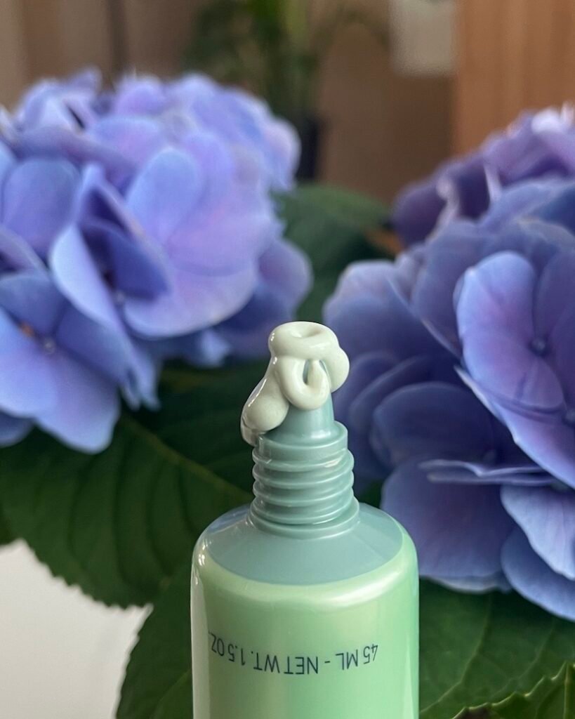 Fresh, Corrected texture of erborian cc red correct cream with flowers