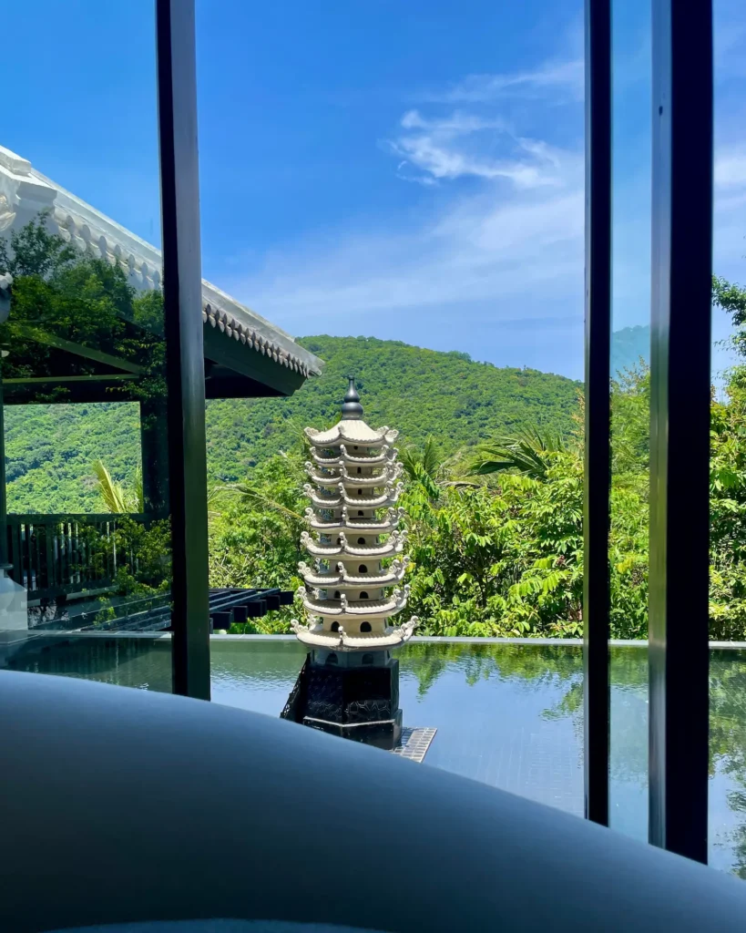 A Return to InterContinental Danang Sun Peninsula Resort serene view of Vietnamese architecture and Mountain View from luxury resort
